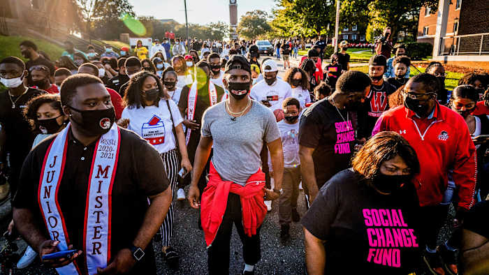 Paul (center) led students in his home state on a march to vote.